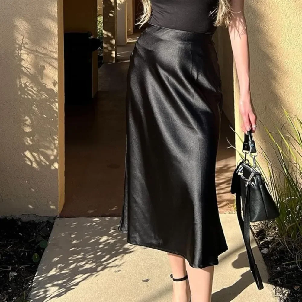 Black satin midi skirt